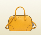 Bright diamante leather top handle bag