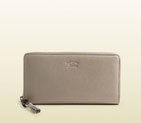 Gucci bamboo tassel leather zip around wallet