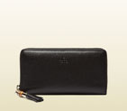 Gucci bamboo tassel leather zip around wallet