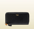Gucci bamboo tassel leather zip around wallet