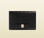 Gucci bow microguccissima leather train pass case