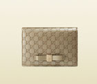 Gucci bow microguccissima leather train pass case