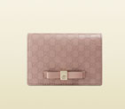 Gucci bow microguccissima leather train pass case