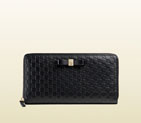 Gucci bow microguccissima leather zip around wallet 388680