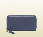 Gucci exclusive bamboo tassel blue leather zip around wallet