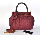 Prada waterproof nylon handbag in Claret