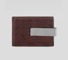 money clip wallet with engraved gucci trademark on