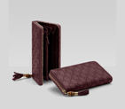 zip around wallet with tassel and bamboo detail