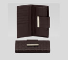 continental wallet with engraved gucci script logo