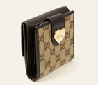 flap french wallet with engraved gucci script logo heart detail