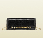 Gucci tigrette evening bag with tiger head and chain detail