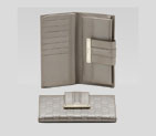 continental wallet with engraved gucci script logo