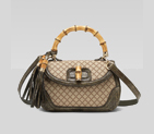 'new bamboo' medium top handle bag with tassels an