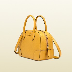 Bright diamante leather top handle bag