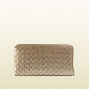 Gucci bow microguccissima leather zip around wallet