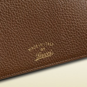Gucci swing leather wallet with strap