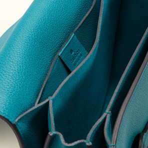 Soft bright bit leather shoulder bag