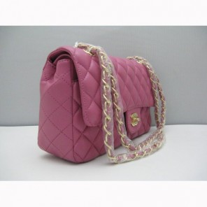 Chanel plum color with gold chain