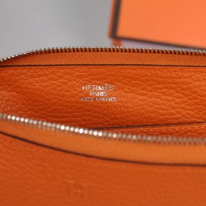 Hermes Zipper Wallet clemence leather in Orange