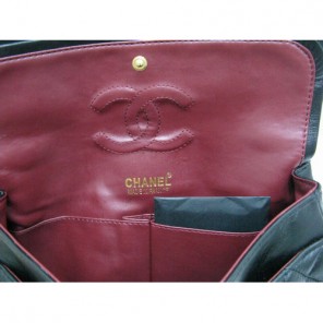 Chanel lambskin leather Black Flap bag with Gold chain