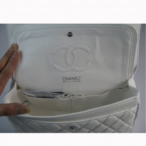 Chanel White color with Silver chain