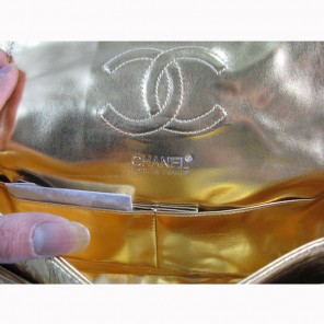 Chanel Gold color with Silver chain