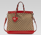 gucci valentine bag with hand stitched heart-shaped leather charm and gucci script logo 282342 FAFXG 8411